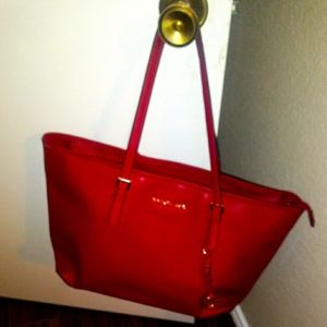 Authentic large red Michael Kors tote